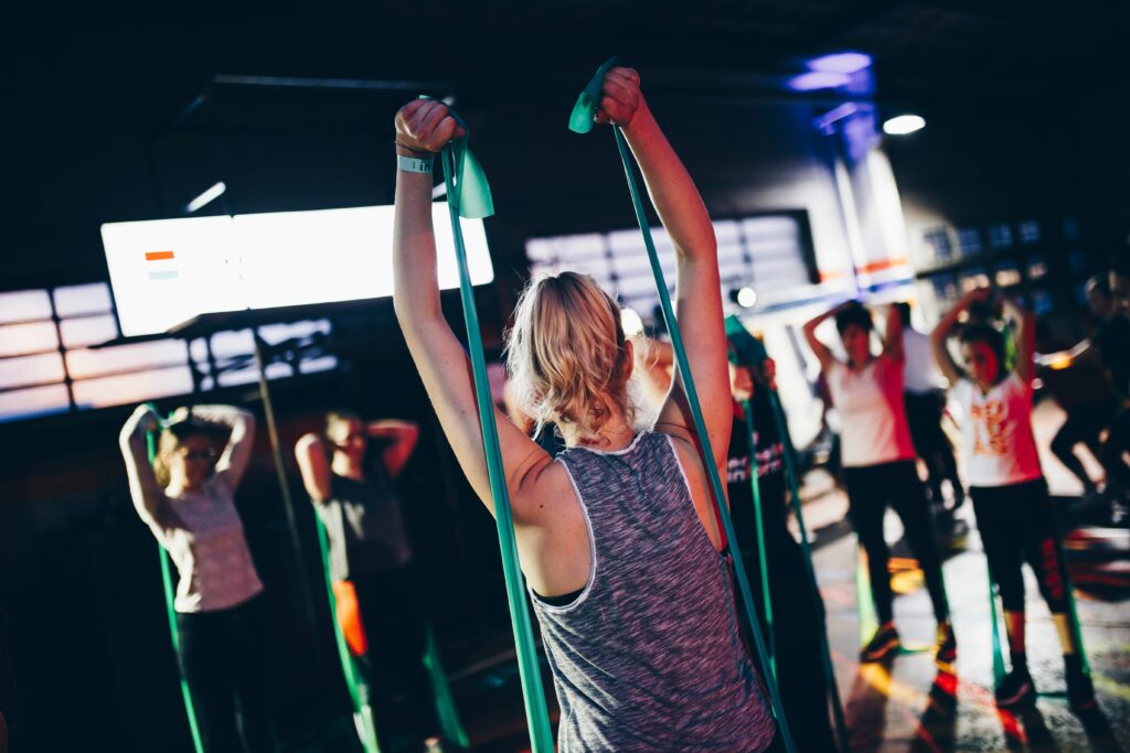 woman working out in group fitness